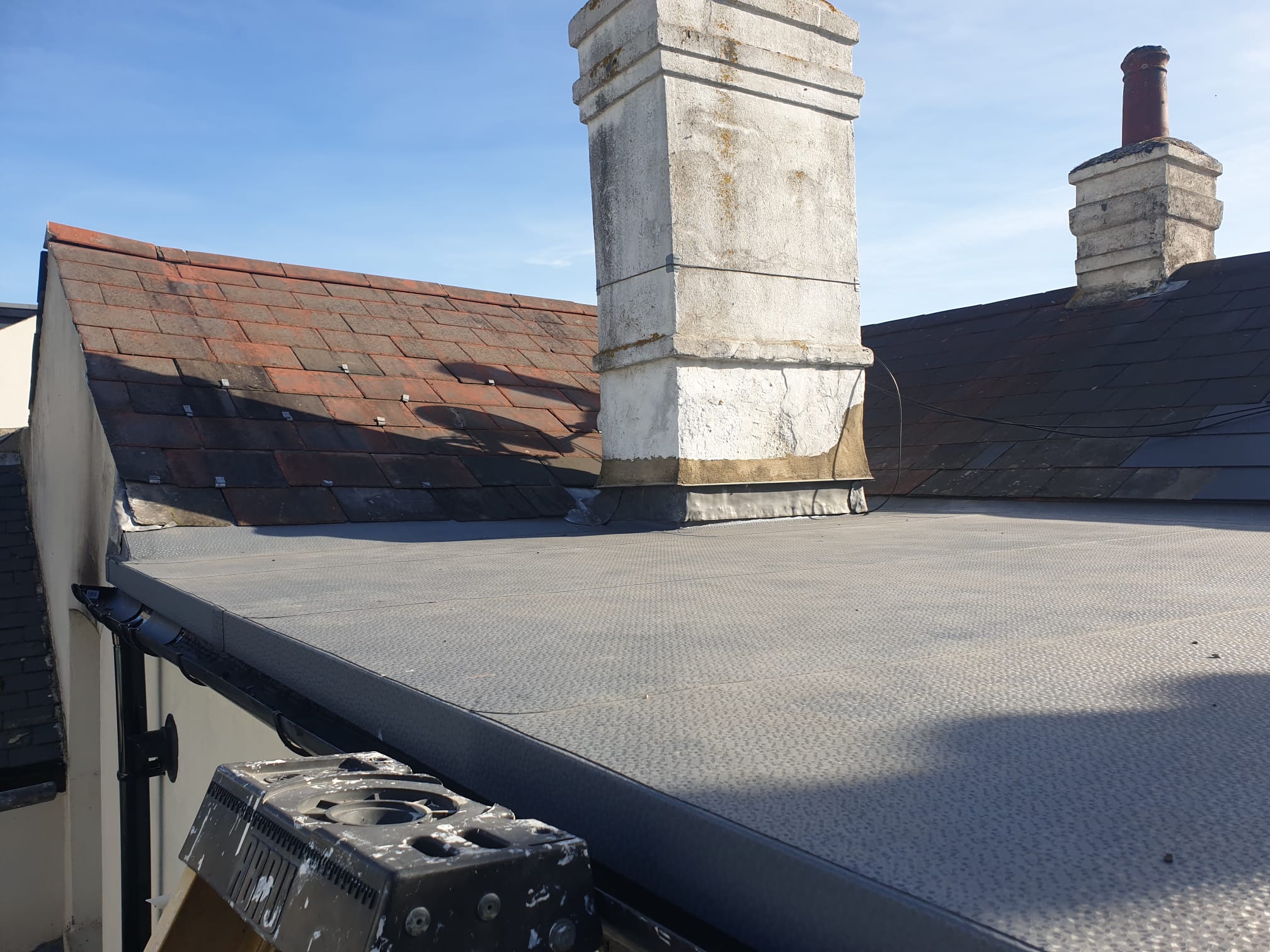 How do you maintain a flat roof?
